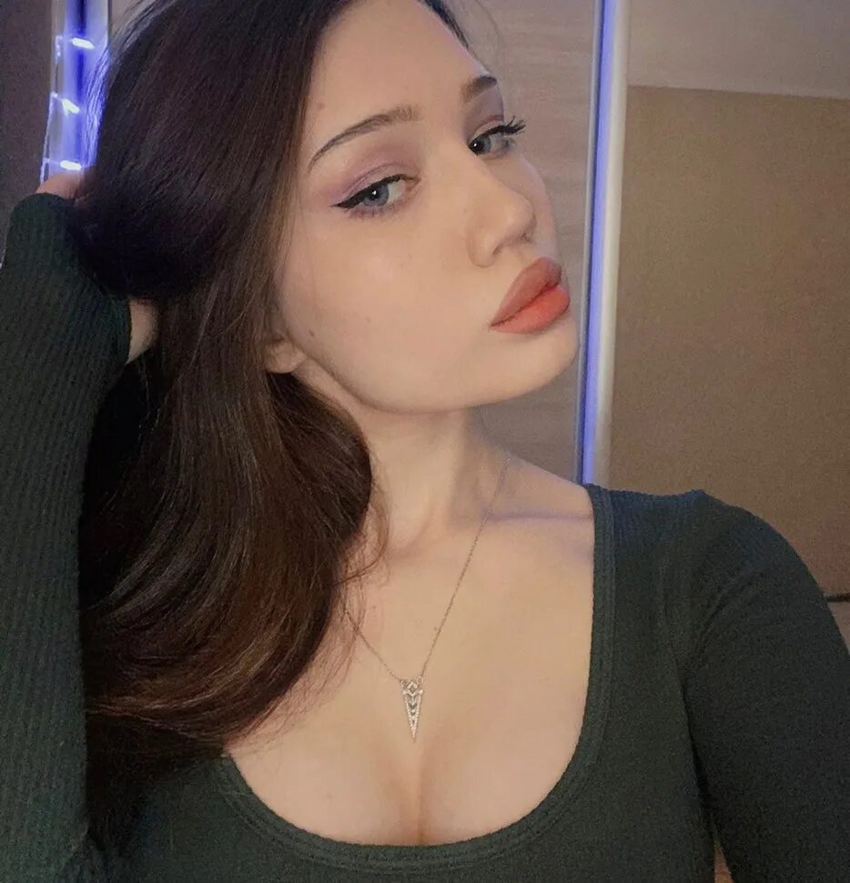 Add orange shirt Dress An background Stuio wall black close up but dont change face